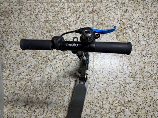 Patinete Oxelo Mid 9 con timbre incluido.