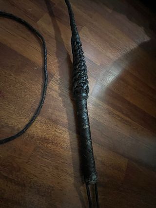 Frusta in pelle intrecciata