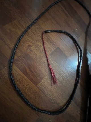 Frusta in pelle intrecciata