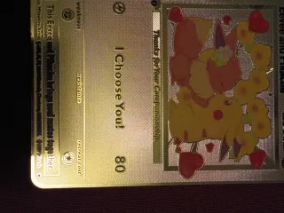 Carta Pokémon Eevee y Pikachu Dorada