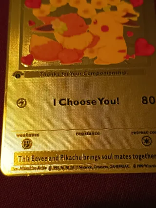 Carta Pokémon Eevee y Pikachu Dorada