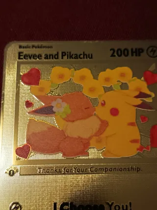 Carta Pokémon Eevee y Pikachu Dorada