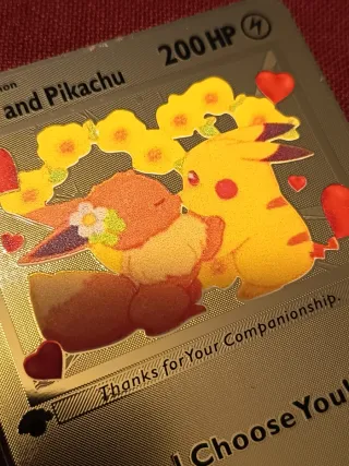 Carta Pokémon Eevee y Pikachu Dorada