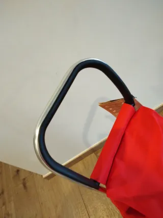 Carro de la compra Rolser rojo.