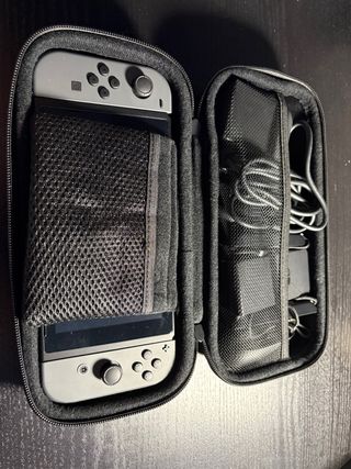 Nintendo Switch Gris + Dock TV + 2 juegos + funda