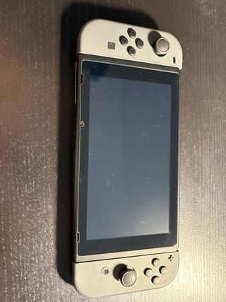 Nintendo Switch Gris + Dock TV + 2 juegos + funda