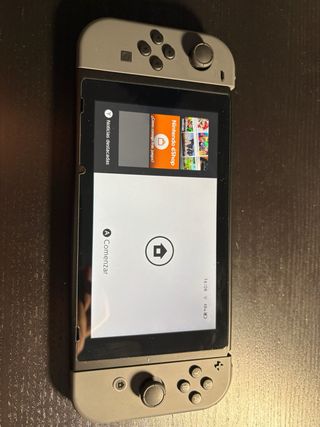 Nintendo Switch Gris + Dock TV + 2 juegos + funda