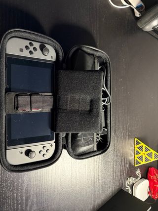 Nintendo Switch Gris + Dock TV + 2 juegos + funda