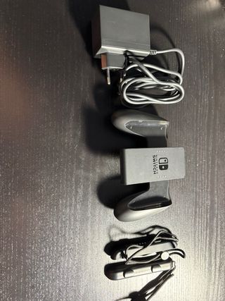 Nintendo Switch Gris + Dock TV + 2 juegos + funda