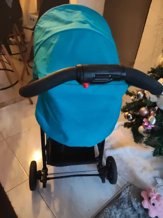 Carrito de bebé Graco de color verde agua