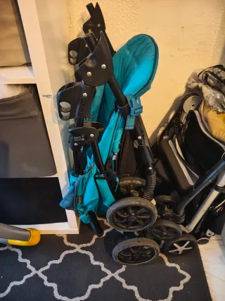 Carrito de bebé Graco de color verde agua