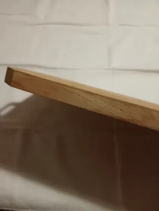 Tagliere in legno con manico in metallo