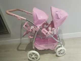 Carrito de muñecas gemelar.