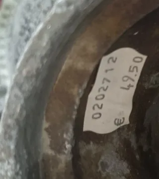 Centro de mesa vintage metal gris