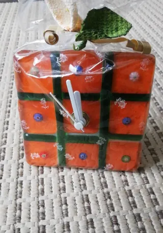 Reloj de cristal naranja