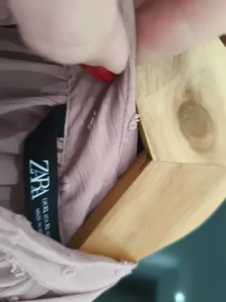 Blusa rosa con lazada y detalles