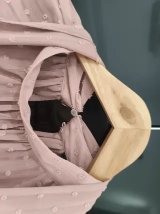 Blusa rosa con lazada y detalles