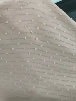 Blusa rosa con lazada y detalles