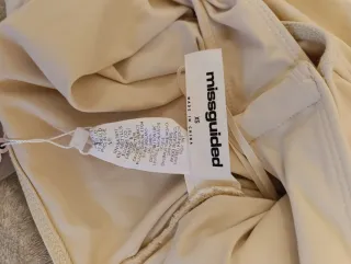 Body drapeado asimétrico beige