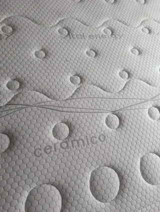 Cama canapé con cabecero tapizado