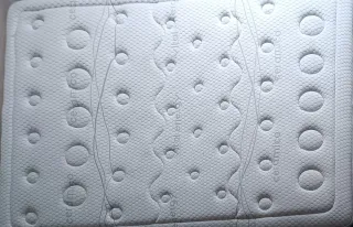 Cama canapé con cabecero tapizado