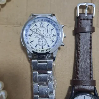 Coppia orologi uomo/donna più collana