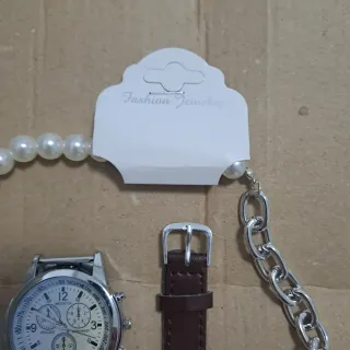 Coppia orologi uomo/donna più collana