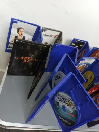 Lote 110Juegos PS2 (PES, FIFA, God of War, etc.)