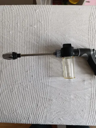 Pistola de agua con dispensador