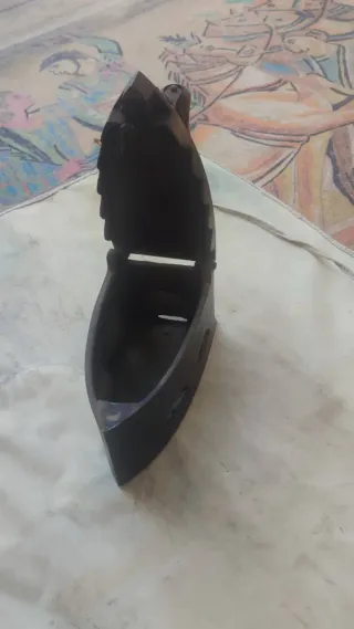 Plancha de carbón antigua