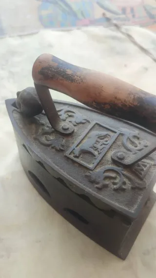 Plancha de carbón antigua