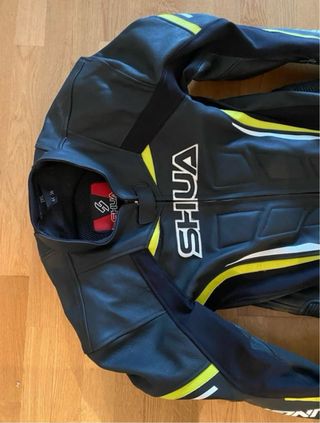 Mono de moto SHUA negro y amarillo