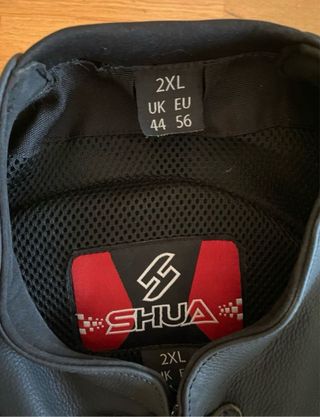 Mono de moto SHUA negro y amarillo