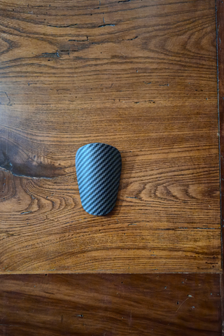 Mini parastinchi calcio carbonio