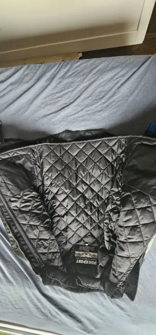 Chaqueta de moto negra y azul