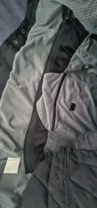 Chaqueta de moto negra y azul