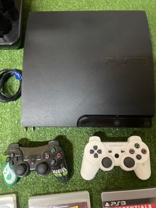 PS3 + 2 Mandos + 18 Juegos+ Base Carga + 3Joystick