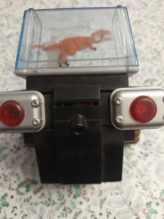 Consola Bio Bytes con figura de dinosaurio