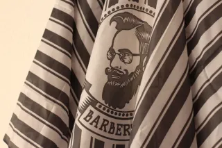 Capa antiadherente de peluquería.