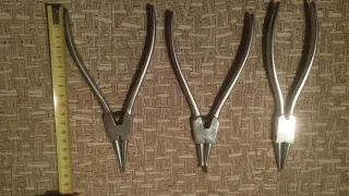 Tres alicates de acero inoxidable