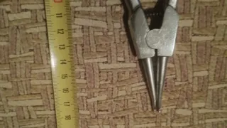 Tres alicates de acero inoxidable