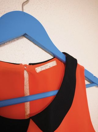 Blusa elegante sin mangas con cuello Peter Pan