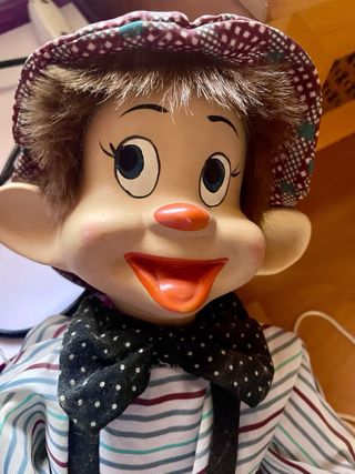 Marioneta de payaso con columpio