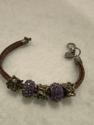 Bracciale in pelle marrone con charm