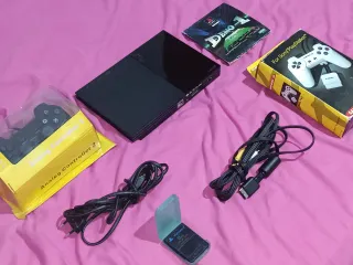 PlayStation 2 super Slim Nera - Console + Accessor