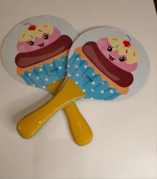 Palas de playa con diseño de cupcake