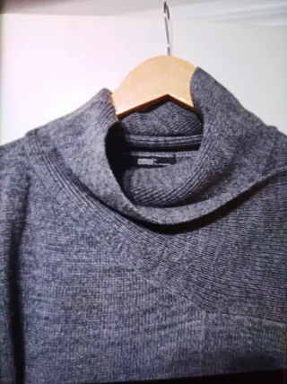 Chaleco punto gris cuello alto