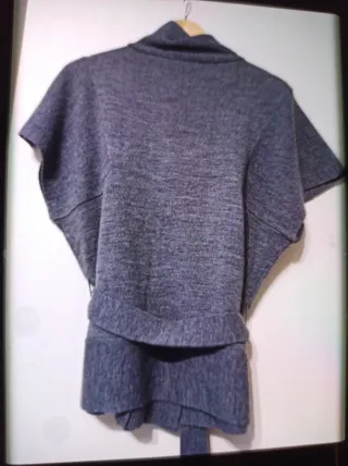 Chaleco punto gris cuello alto