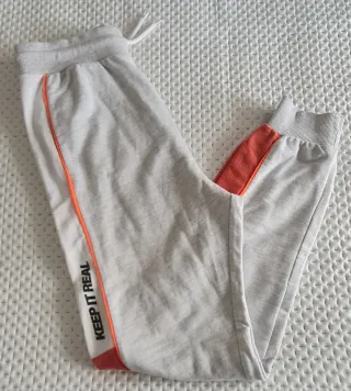 Calças de treino rapaz com risca laranja