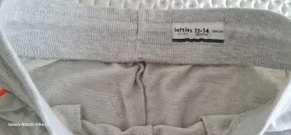 Calças de treino rapaz com risca laranja